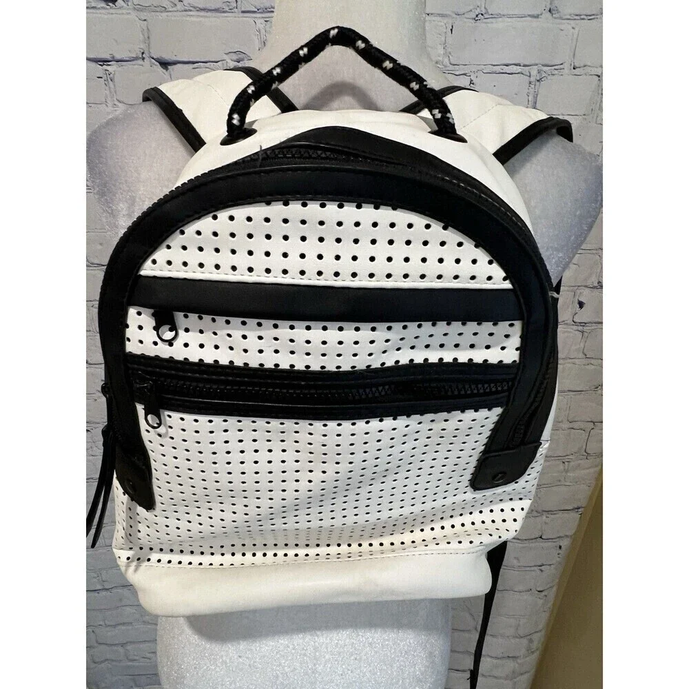 Merona white with black trim Faux leather backpack Lots of Pockets adjustable